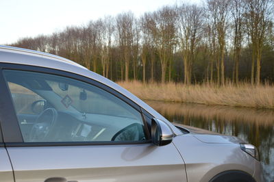 Close-up of car against sky