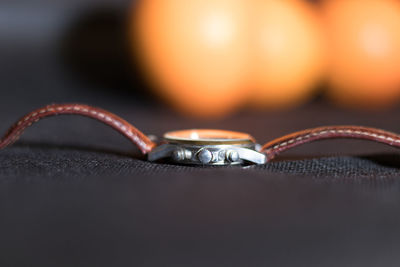 Close-up of wristwatch on table