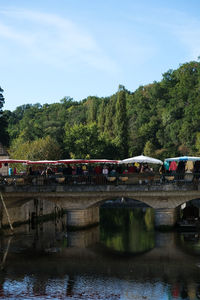 Bridge over river against sky