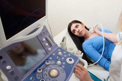 Doctor examining patient