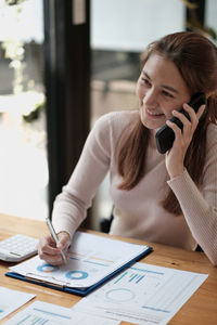 Businesswoman working at office