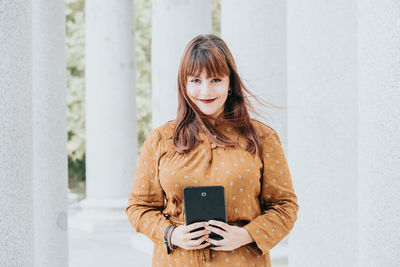 Young woman using mobile phone