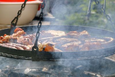 Close-up of meat on barbecue grill