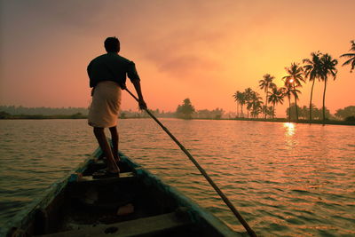 Silhouette of woman at sunset