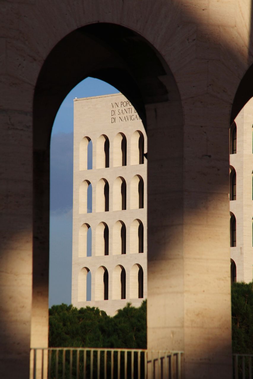 BUILDING SEEN THROUGH ARCH