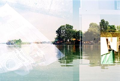 Digital composite image of swimming pool by lake
