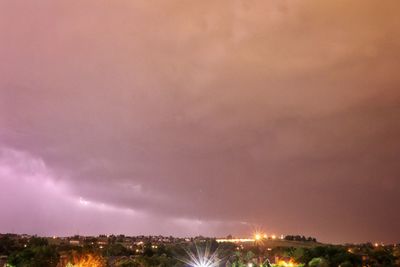 Illuminated cityscape at night