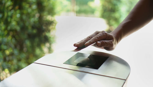 Close-up of hand holding smart phone