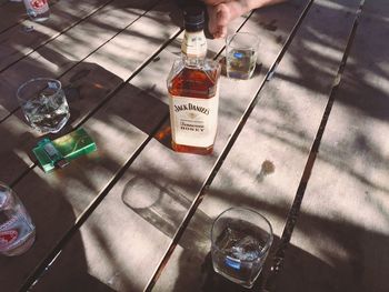 High angle view of wine glass on table