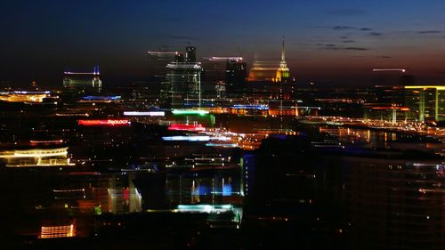 Illuminated cityscape at night