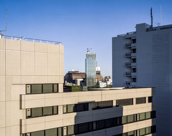 Modern buildings against blue sky