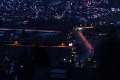 Red and white light trails of cars citiyscape