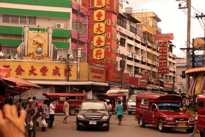 People and vehicles on city street