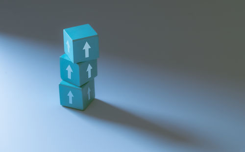 Close-up of toy blocks on blue background