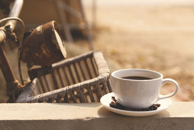 Close-up of coffee cup on table