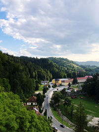 High angle view of trees and buildings against sky