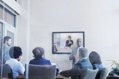 Businessman explaining colleagues during meeting in conference room