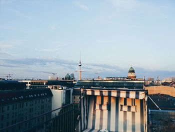 View of buildings against cloudy sky