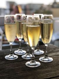 Close-up of wine glasses on table