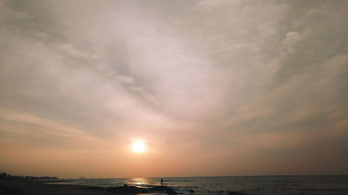 Scenic view of sea at sunset