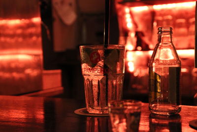 Close-up of wine glasses on table