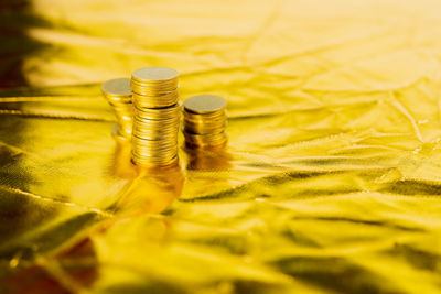 Close-up of coins on table