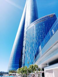 Low angle view of modern buildings against sky