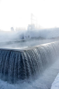 Overflow of water on the technological channel of the hydroelectric power station