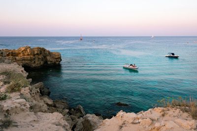 Scenic view of sea against clear sky