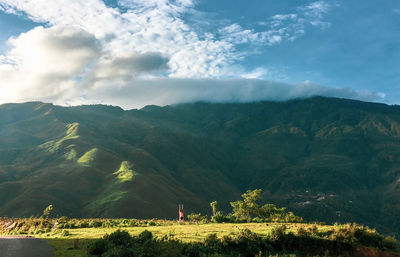 Scenic view of mountains against sky