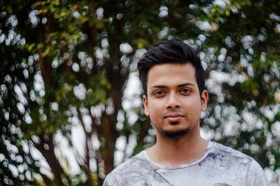 Portrait of young man outdoors