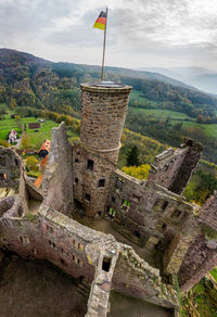 Old ruins on mountain against sky