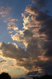 Low angle view of clouds in sky during sunset