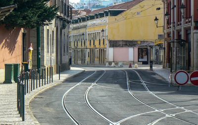 Cars parked on street in city