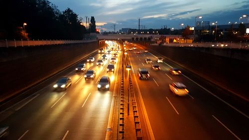 High angle view of light trails on road in city