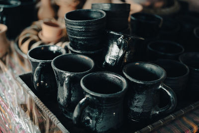 Close-up of containers on table