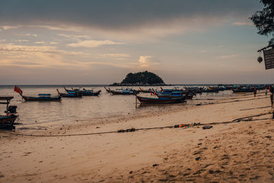 Scenic view of beach against sky during sunset