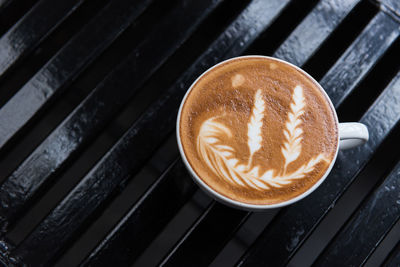 Close-up of cappuccino on table