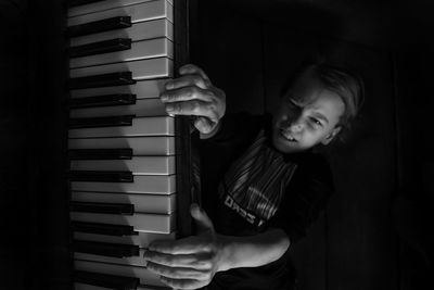 Girl playing piano at home