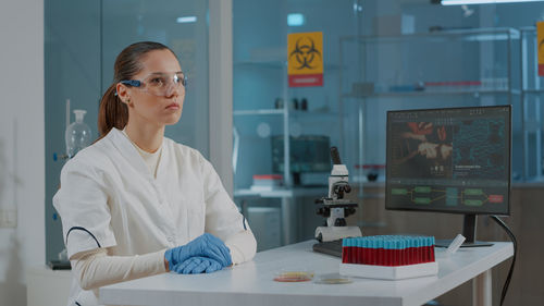 Young scientist working at laboratory