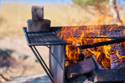 Close-up of meat on barbecue grill