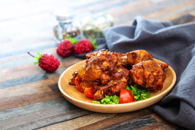 Close-up of food served on table