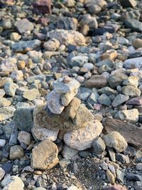 High angle view of stones on pebbles