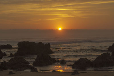 Beautiful sunset falls on a cushion of clouds on the horizon