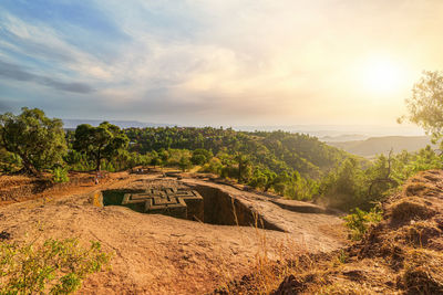 Scenic view of landscape against sky during sunset