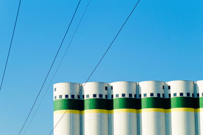 High section of pole against blue sky