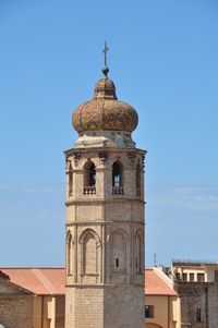 Low angle view of building against blue sky