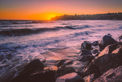 Scenic view of sea against sky during sunset