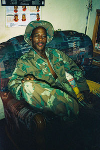 Portrait of a smiling man sitting in car