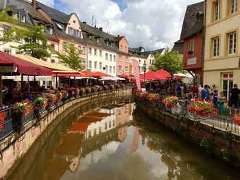 People walking along canal